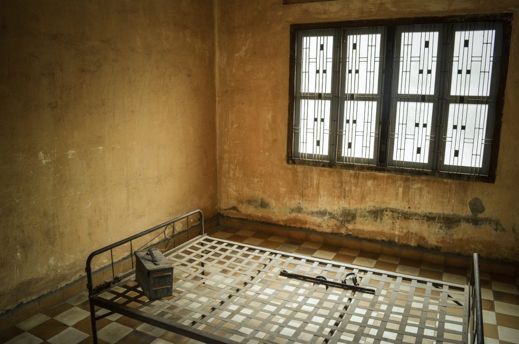 Interior view of prison cell at the Tuol Sleng Genocide Museum, Phnom Penh, Cambodia.